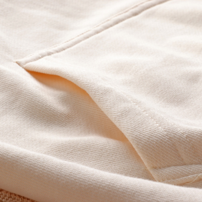 Taylors Evermore Hoodie - Beige eras knit hoodie folded showing embroidery