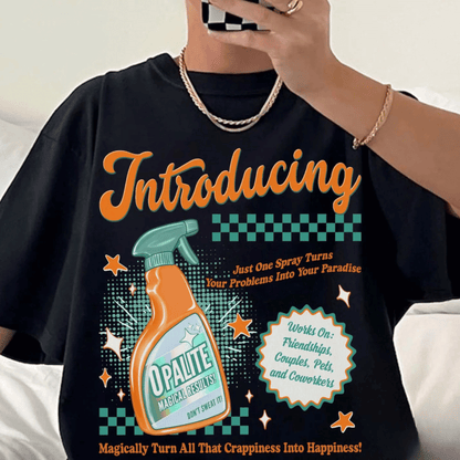 Black t-shirt with colorful graphic and text, featuring a spray bottle and text about 'Opalite'.