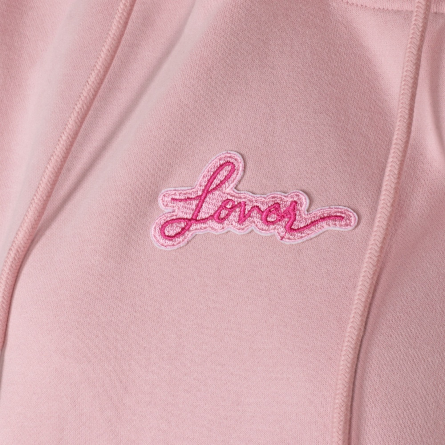 Taylors Lover Hoodie - Pink eras knit hoodie folded showing embroidery