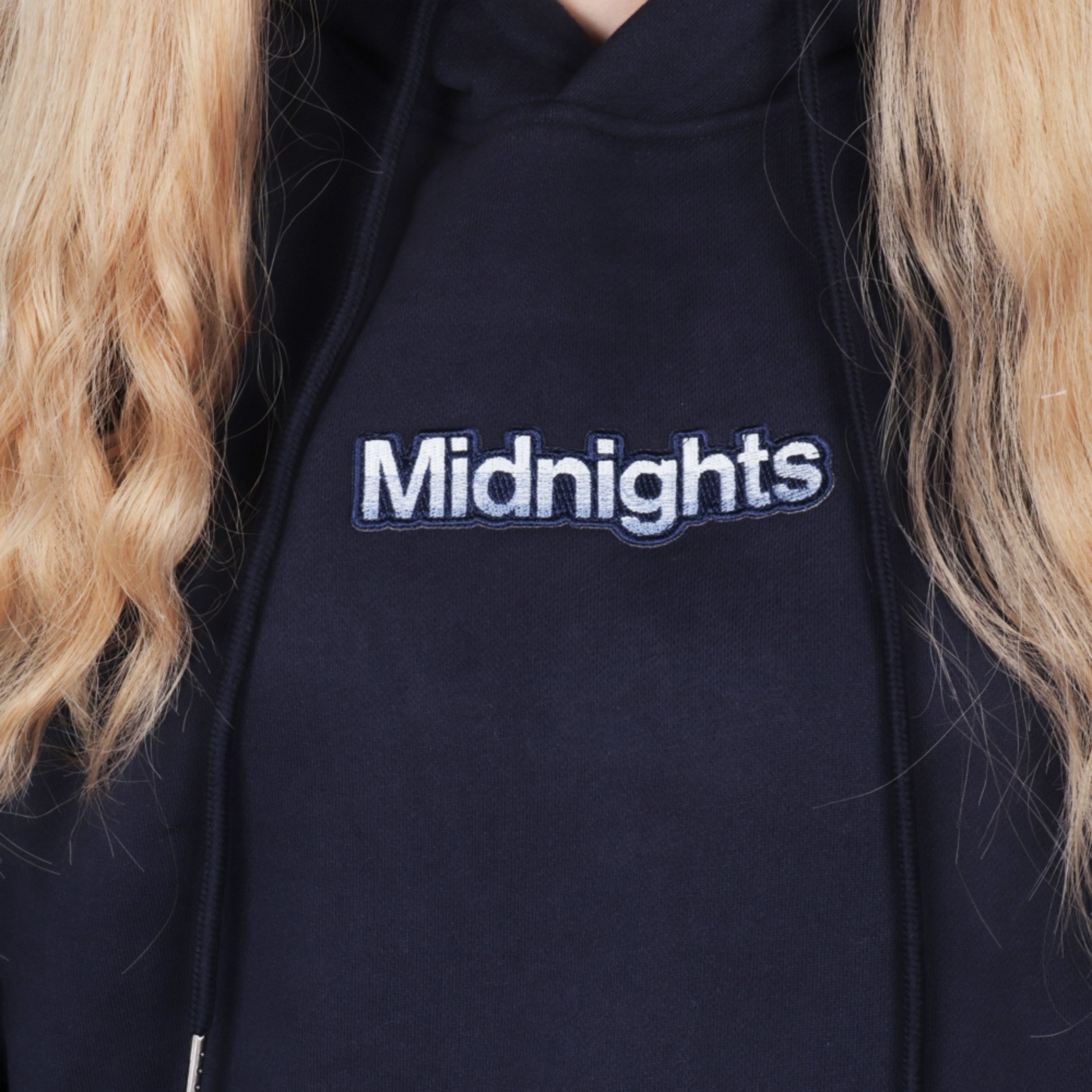 Midnights Hoodie Taylors Version - Close up of multicolor embroidered eras album detail on navy hoodie
