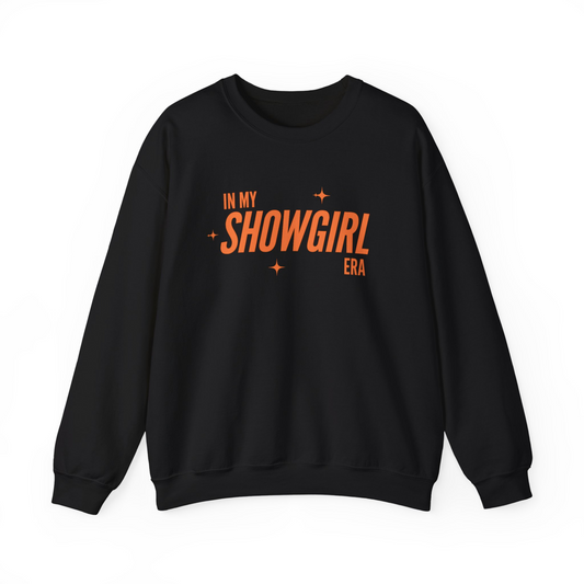 Black sweatshirt with orange text 'IN MY SHOWGIRL ERA' on a white background