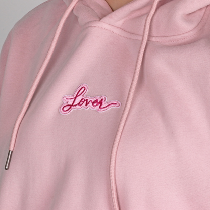 Taylors Lover Hoodie - Close up of pink embroidered eras album detail