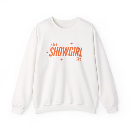 White sweatshirt with orange text 'IN MY SHOWGIRL ERA' on a white background